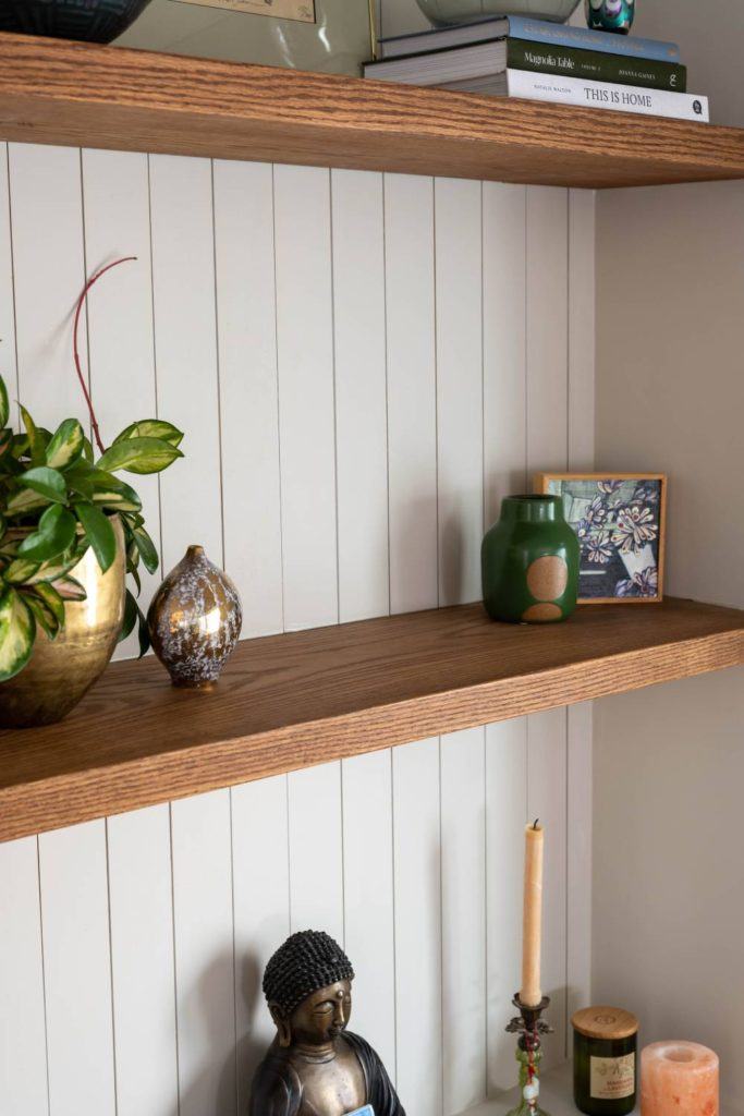 a couple of shelves that have some plants on top of them